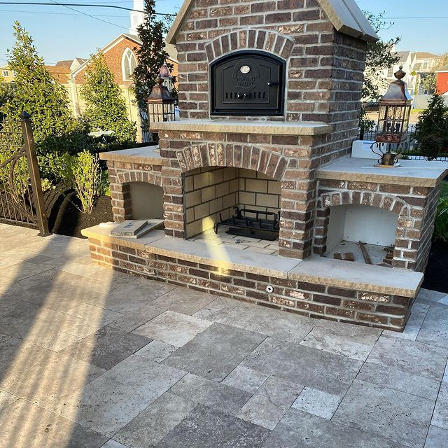 Stonework outdoor fireplace